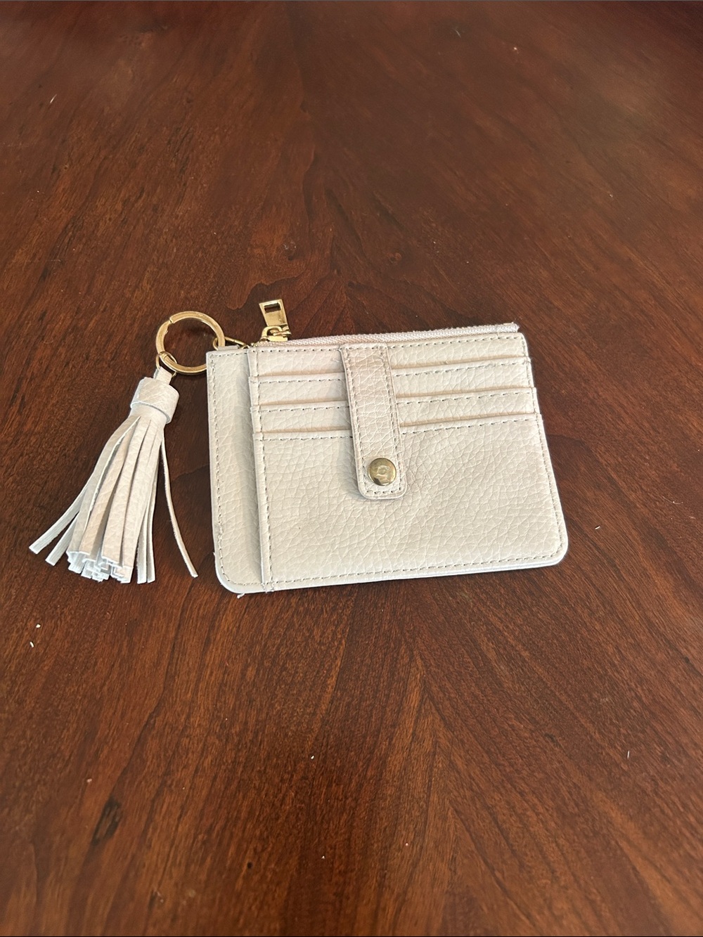 Silver credit card/money holder.